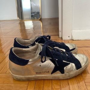 Navy and silver Golden Goose superstar low-top sneakers
